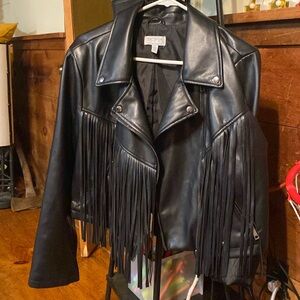Black leather coat with black fringe around it
